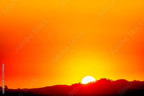 Orange Glow of Sunrise, Sunset over Horizon 