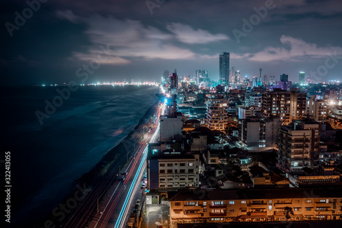 Sri?Lanka, Western Province, Colombo, High angle view of coastal city at night photo