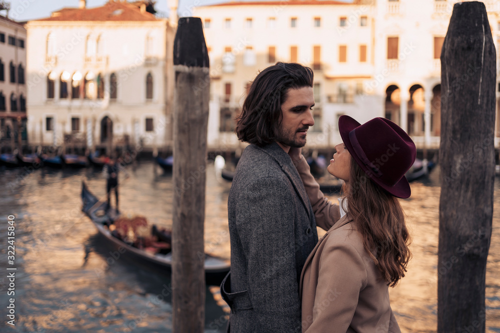 Affectionate young couple at the Canal Grande in Venice, Italy Affectionate young couple at the Canal Grande in Venice, Italy