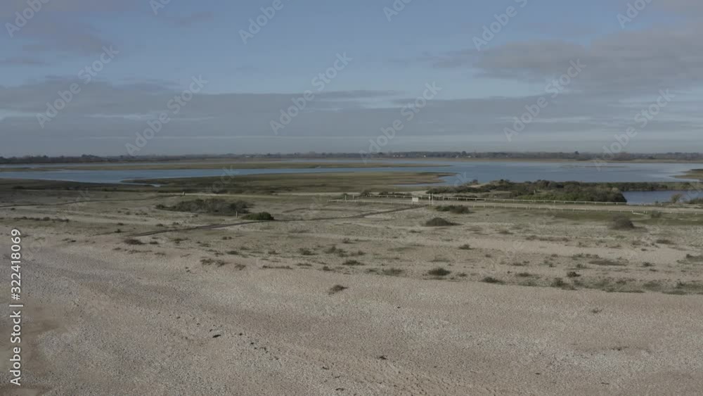 Aerial view of Pagham Harbour from the beach on a clear and sunny winters day. Aerial view of Pagham Harbour from the beach on a clear and sunny winters day.