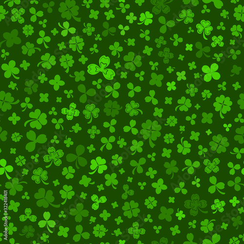 Seamless pattern on St. Patrick's Day made of clover leaves in green colors