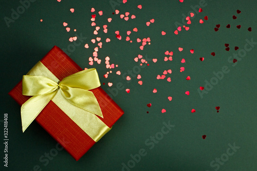 gift in a red festive box, holiday concept, place for your text