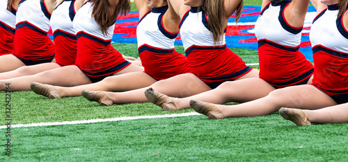 Kickline team in full front splits to tnd thier performance photo