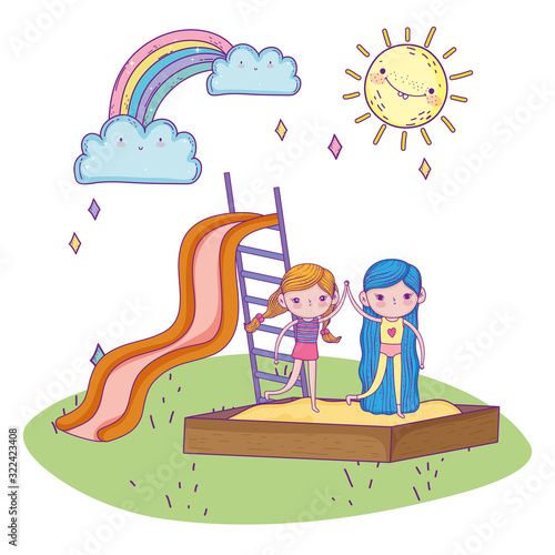 happy childrens day, girls together smiling in sandbox and slide park