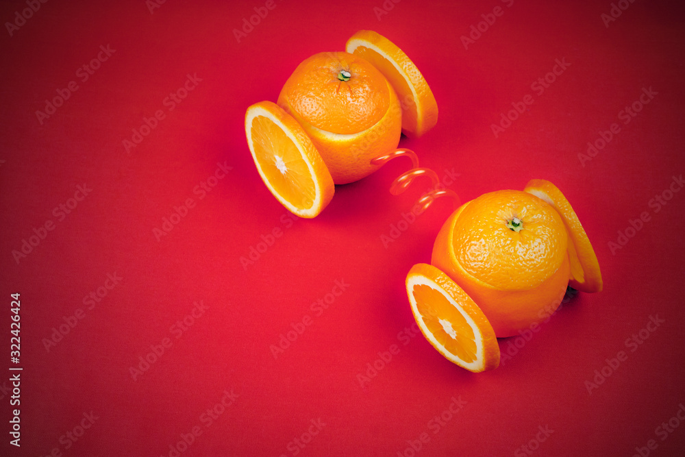 Orange fruit in the form of a car.