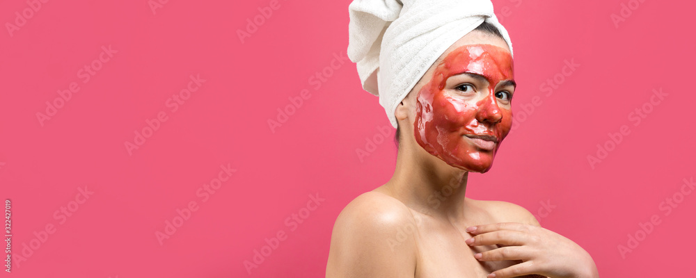 Beauty portrait of woman in white towel on head with gold nourishing mask on face. Skincare cleansing eco organic cosmetic spa relax concept. Beauty portrait of woman in white towel on head with gold nourishing mask on face. Skincare cleansing eco organic cosmetic spa relax concept.