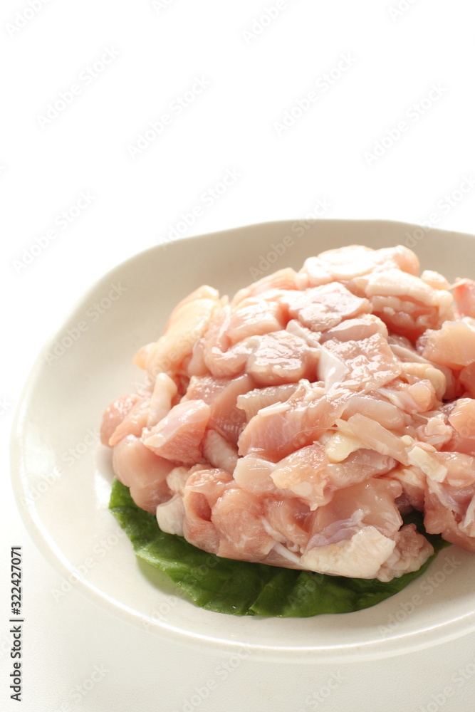 Chopped chicken on dish for prepared ingredient Chopped chicken on dish for prepared ingredient