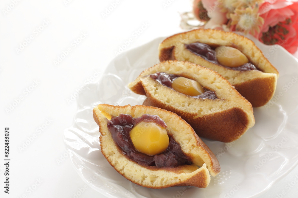 Japanese confectionery food, chestnut and red bean paste Dorayaki Pan cake sandwiches in half Japanese confectionery food, chestnut and red bean paste Dorayaki Pan cake sandwiches in half