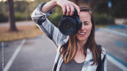 A woman taking a photograph