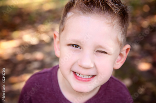 Cute Little Boy One Eye Closed