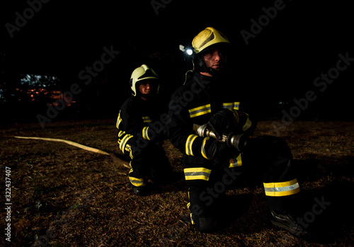 Fototapeta Naklejka Na Ścianę i Meble -  Firefighters in action