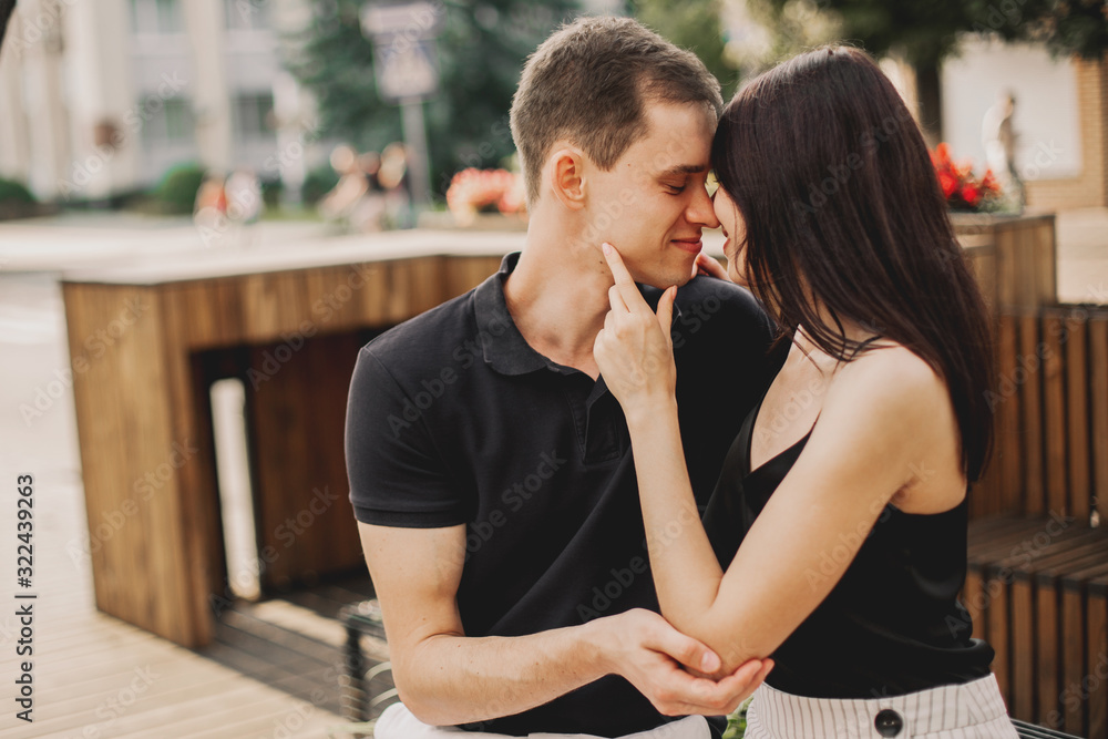 Loving couple hugging in the street. Loving couple hugging in the street.