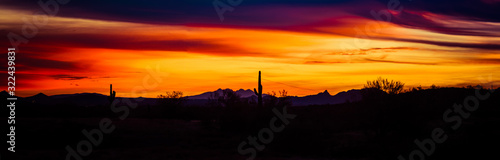 Panoramic image of a sunset over the Sonoran Desert of Arizona.