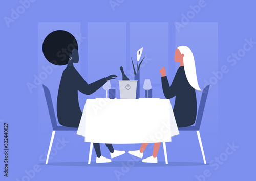 Fine dining restaurant, interracial lesbian couple having romantic dinner, anniversary celebration, first date or saint valentines day