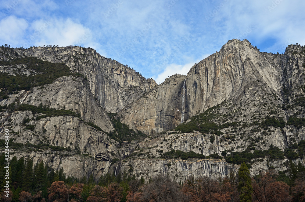 Yosemite Falls and surrounding granite rock formations in Yosemite National Park, California in winter.