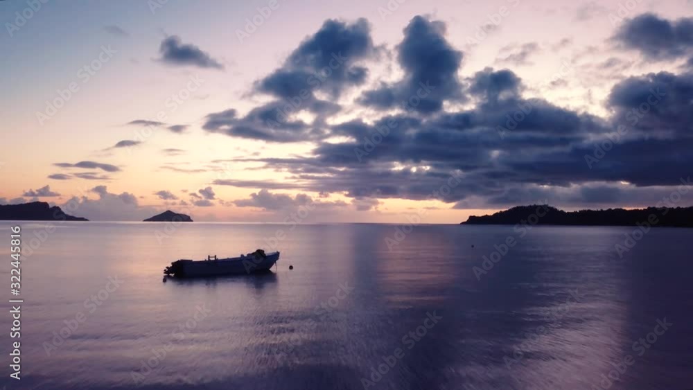Silhouette of boat In the sea During Sunset at the Comoros Marine Park Silhouette of boat In the sea During Sunset at the Comoros Marine Park