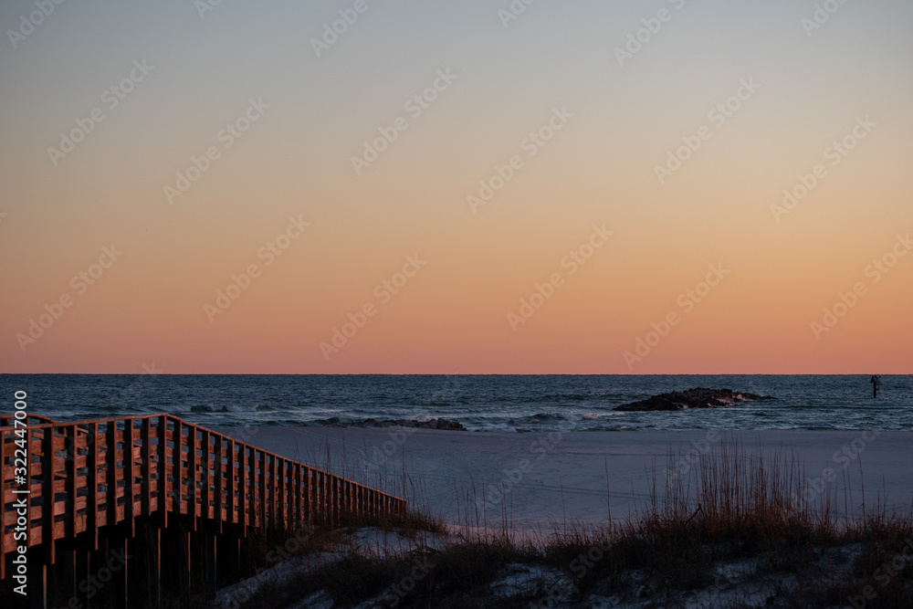beach boardwalk sunset glow beach boardwalk sunset glow