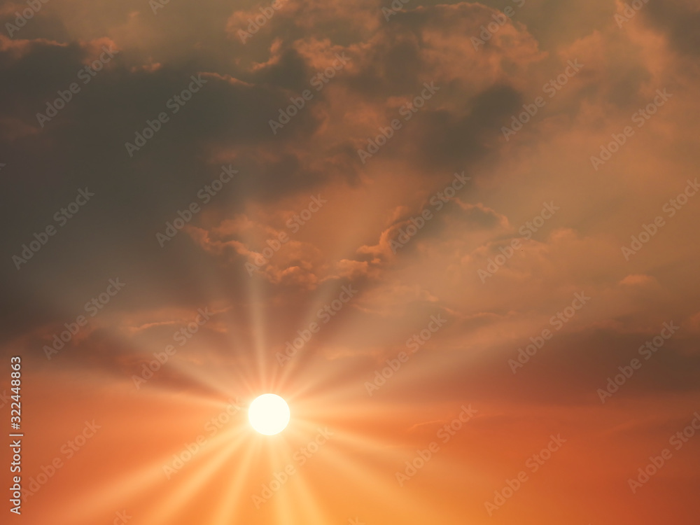 Beautiful sunset sky and clouds with dramatic light, Twilight sky and sun rays, Orange and red sky background with light of the sun-Image