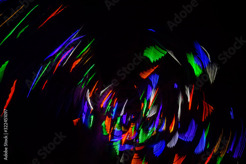 Картината върху платно Colour halo in black background