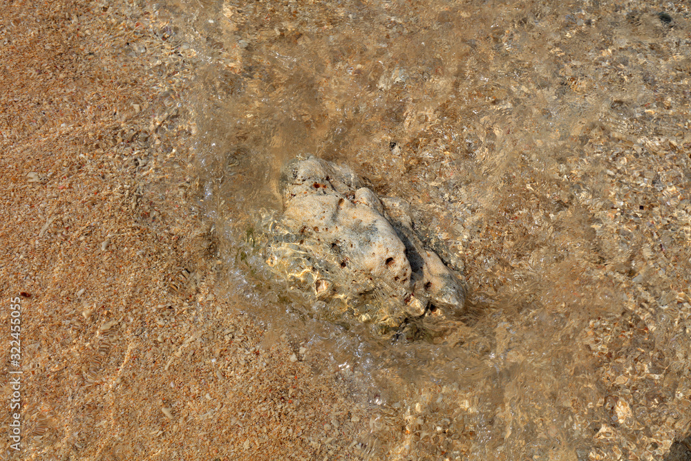 Rocks in the waves, in the natural environment Rocks in the waves, in the natural environment
