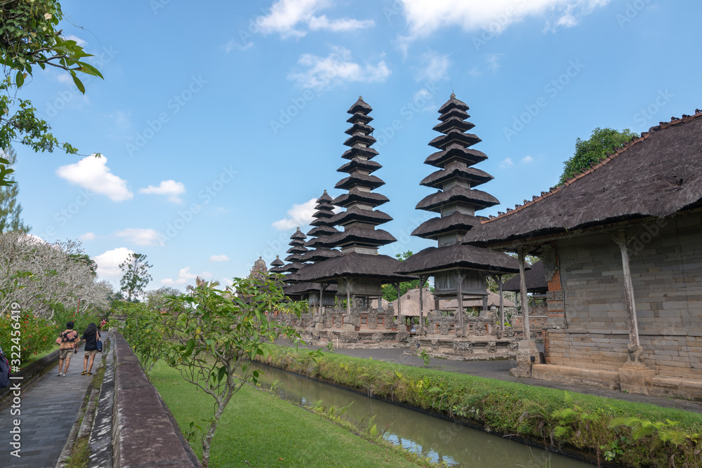 The scenery of the Pura Taman Ayun Temple with a clear blue sky in Bali, Indonesia.
