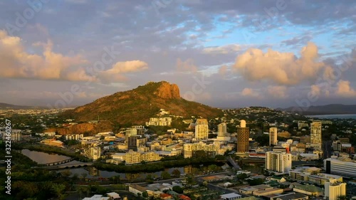 Reverse sunrise drone timelapse of Townsville City, North Queensland Australia photo