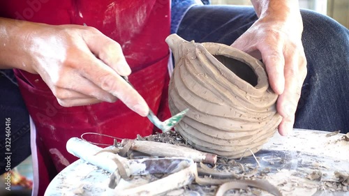 Carving pottery 