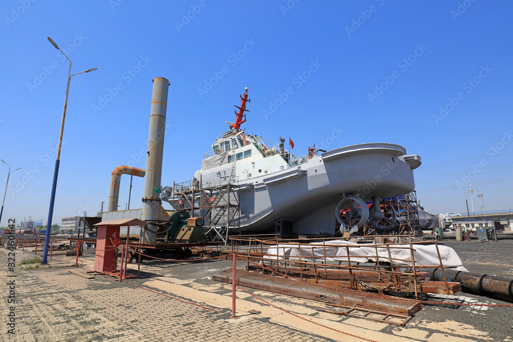 Fototapeta premium Ships awaiting repair are at the shipyard, Luannan County, Hebei Province, China