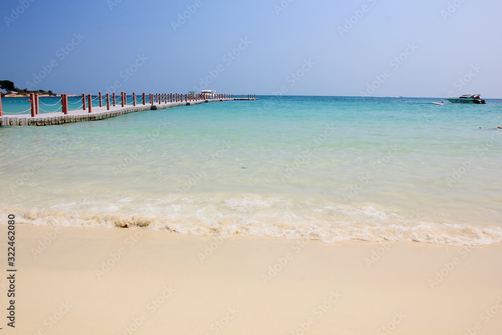 The pier is beach the Wong Duaen, Samet Island,The sea on a clear day.