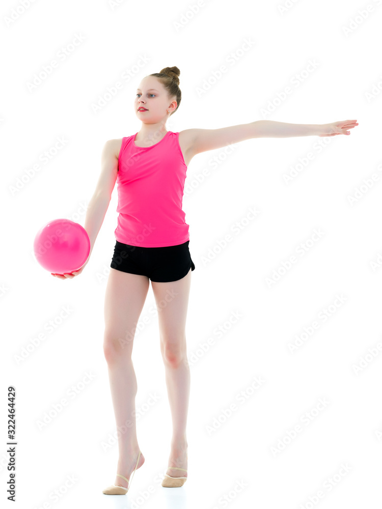 little girl is engaged in fitness with a ball. little girl is engaged in fitness with a ball.