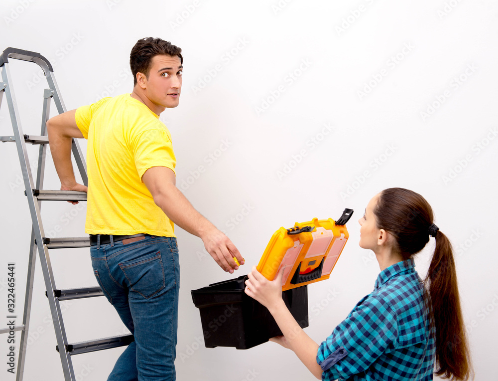 Wife and husband family doing home improvements Wife and husband family doing home improvements