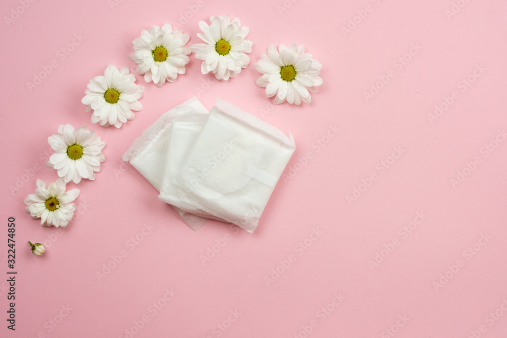 Packing of female liners on a pink background Packing of female liners on a pink background