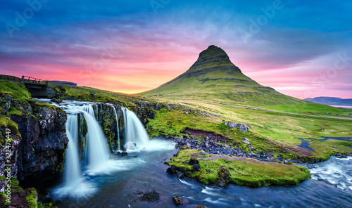 Picturesque landscape with Kirkjufellsfoss waterfall and Kirkjufell mountain, Iceland, Europe. photo