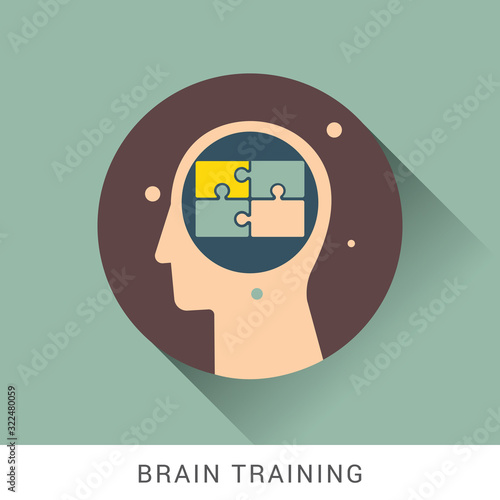 Icon of human head with piece of puzzle