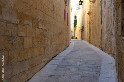 Fototapeta Naklejka Na Ścianę i Meble -  narrow ancient street in Mdina, Malta