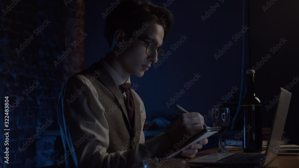Young man working with laptop, slow motion Young man working with laptop, slow motion