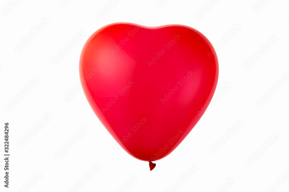Red heart shaped ball on white background top view flat lay Red heart shaped ball on white background top view flat lay