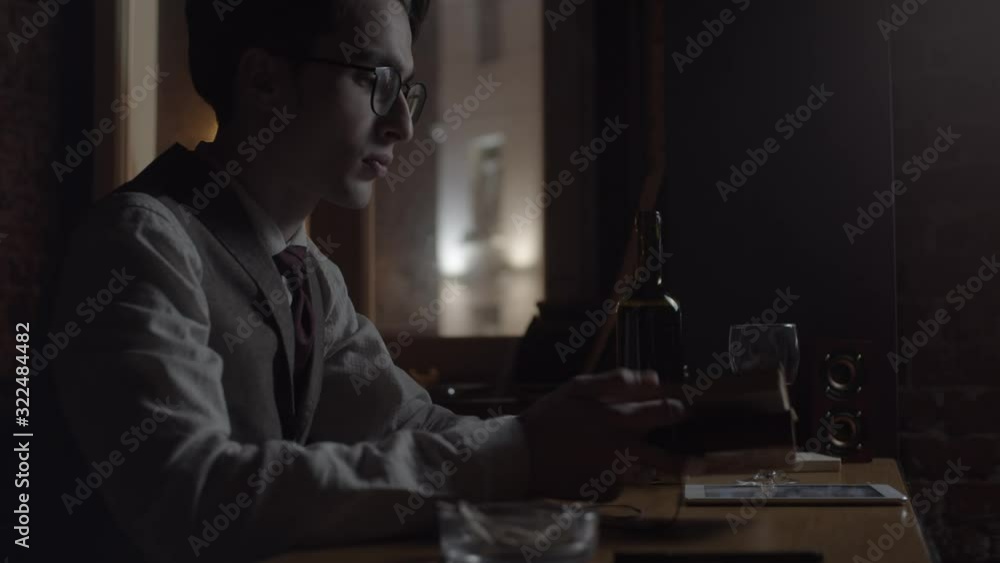 Young man with paper notebook, slow motion Young man with paper notebook, slow motion