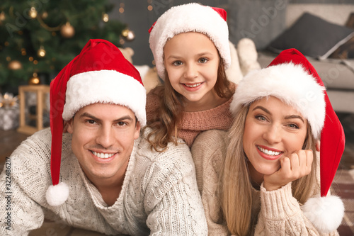 Happy family on Christmas e...
