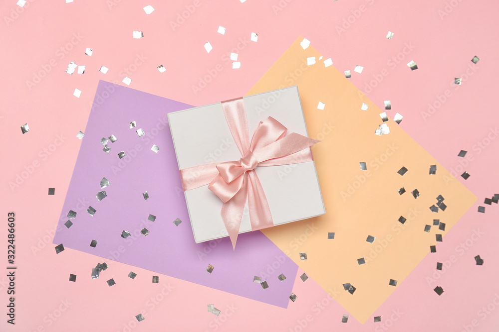Beautiful gift box on color background Beautiful gift box on color background