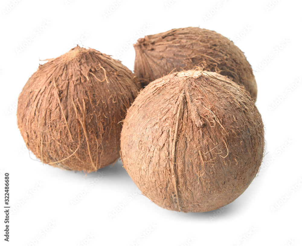 Ripe coconuts on white background Ripe coconuts on white background