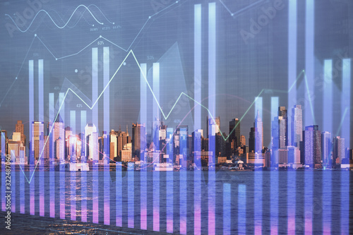 Forex chart on cityscape with tall buildings background multi exposure. Financial research concept.