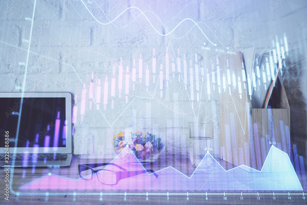 Financial market graph hologram and personal computer on background. Multi exposure. Concept of forex. Financial market graph hologram and personal computer on background. Multi exposure. Concept of forex.