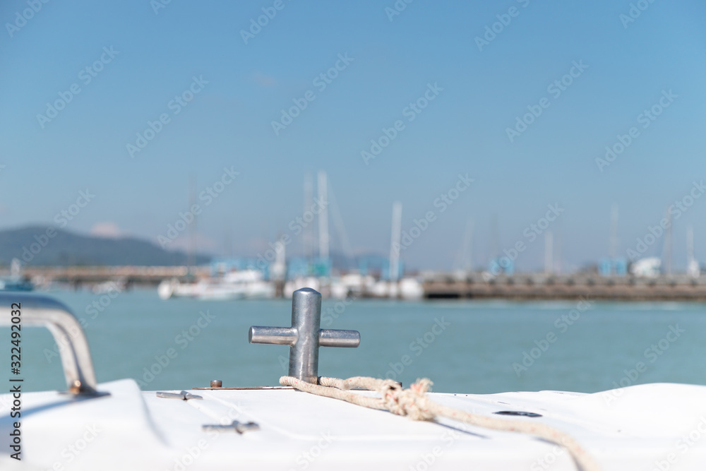 Fototapeta premium Close up at anchor In front of speed boat while sailing to the bay with calm sea wave