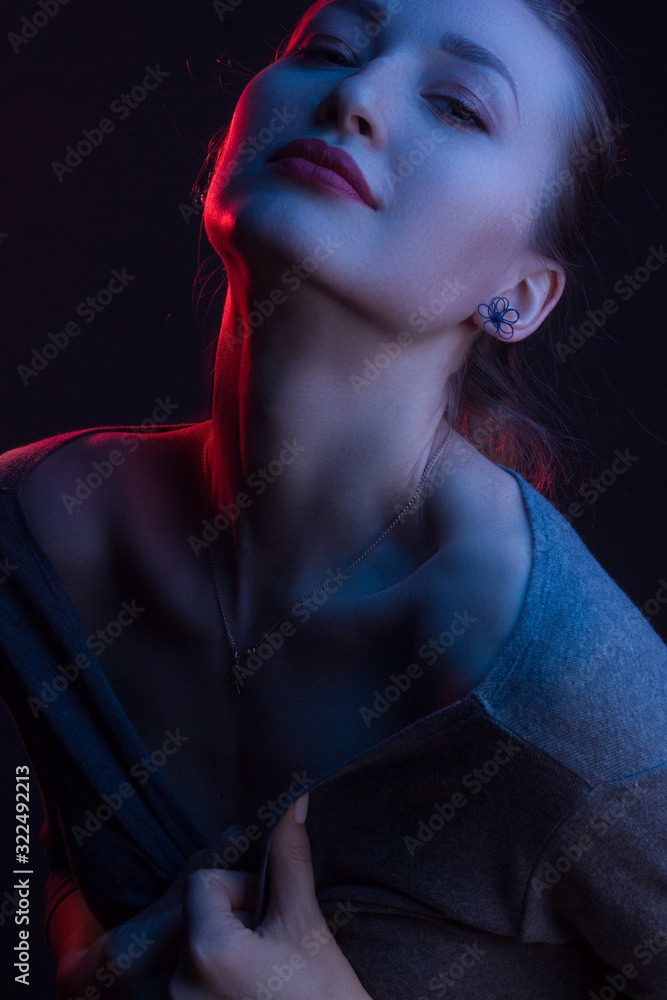 Fashionable Artistic Portrait Of A Beautiful Female Model In Bright Lights Fashionable Artistic Portrait Of A Beautiful Female Model In Bright Lights