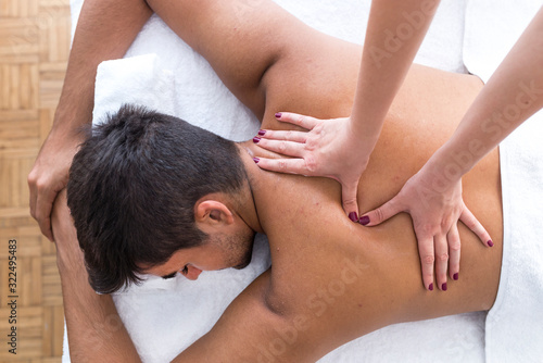 Man having a massage in a wellness center