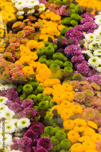 Flower chrysanthemums bouquets backgrounds of bright variety of colors, beautiful details in one bouquet. Selective focus