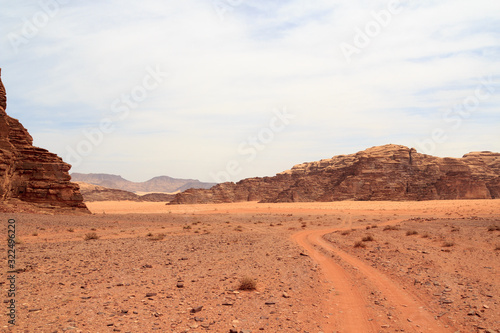 Wadi Rum desert panorama with dunes  mountains and sand that looks like planet Mars surface  Jordan