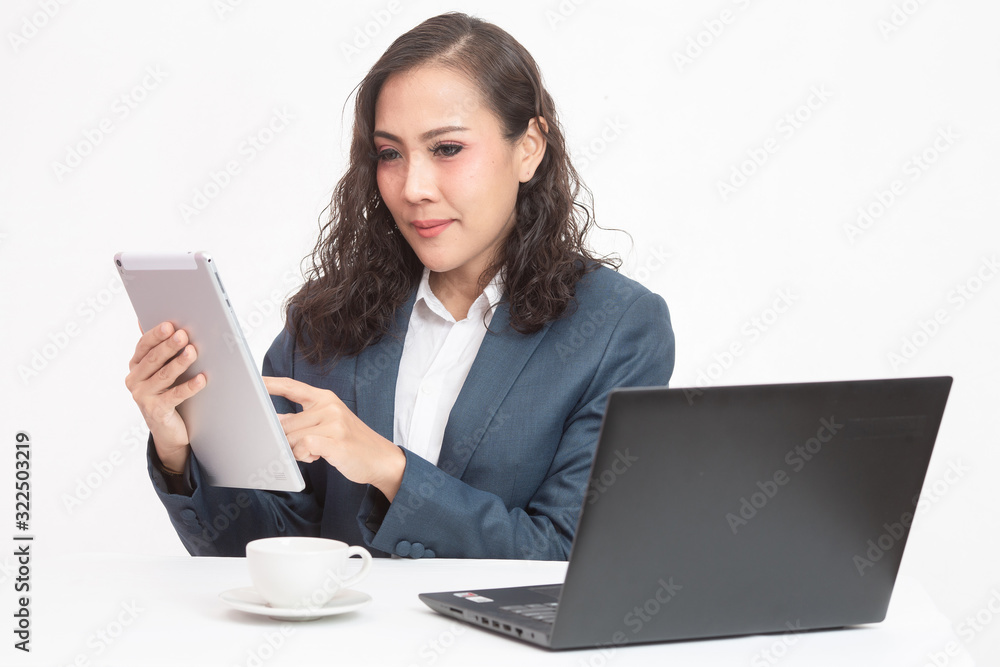 Beautiful young executive with her work and coffee Beautiful young executive with her work and coffee