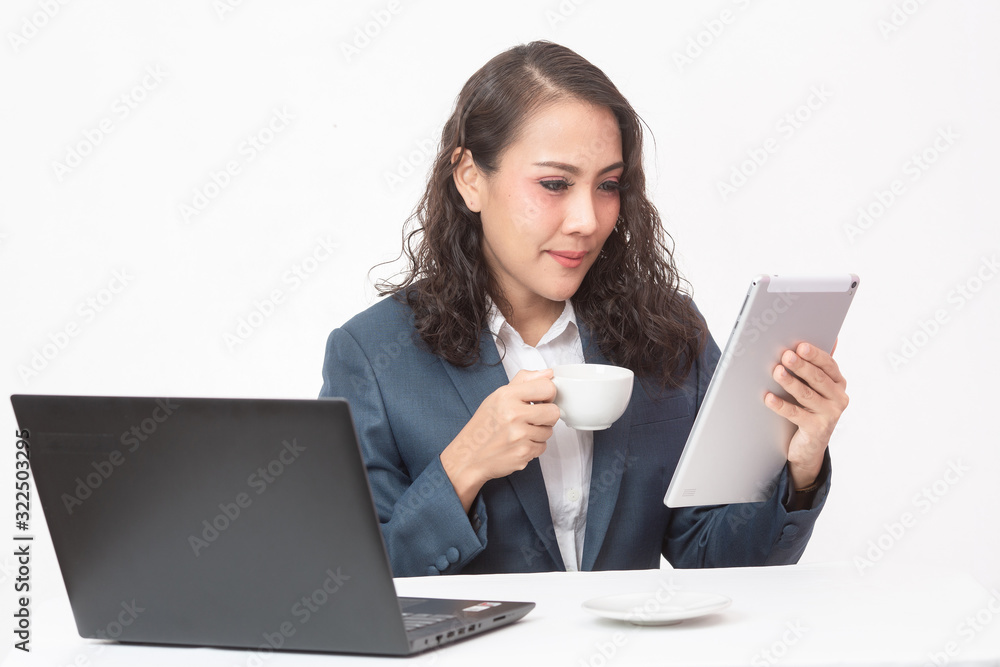Beautiful young executive with her work and coffee Beautiful young executive with her work and coffee